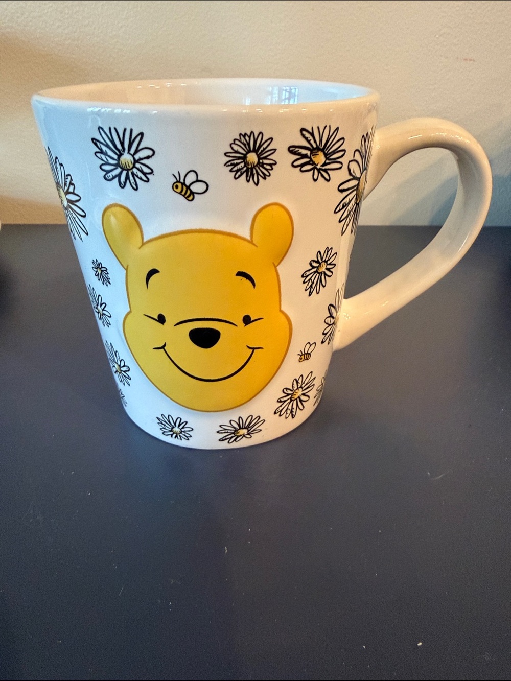 Winnie the Pooh Embossed Daisy Mug - Yellow Face 14 ounces
